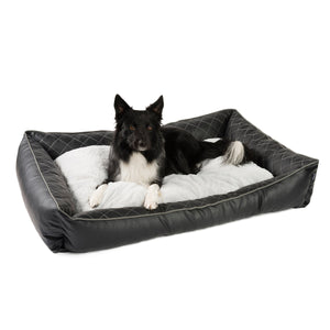 Hundebett aus Kunstleder mit Steppnähten und zusätzlichem Wendekissen 
